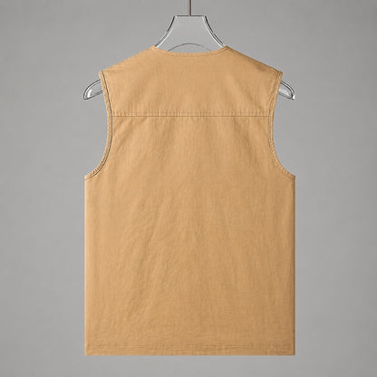 A sleeveless tan cotton vest displayed on a clear hanger against a solid gray background.