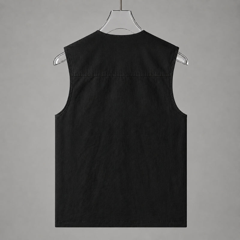 A black sleeveless vest displayed from the back on a clear plastic hanger against a solid gray background.