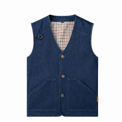 A sleeveless dark blue denim vest with a V-neck, three brown buttons, and two front patch pockets, shown flat against a white background.