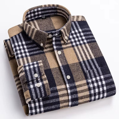 Folded plaid shirt with brown, blue, and beige pattern on a white background