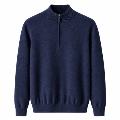 A navy blue half-zip knit sweater with a ribbed mock neck, cuffs, and hem, shown against a plain white background.