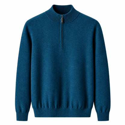 A men's long-sleeve half-zip knit sweater in a deep teal blue color, featuring a ribbed mock neck, cuffs, and hem, shown against a plain white background.