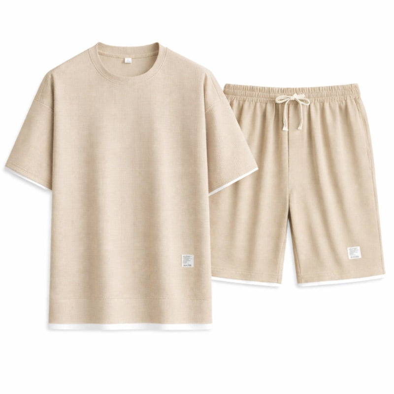 Beige t-shirt and shorts set on a white background