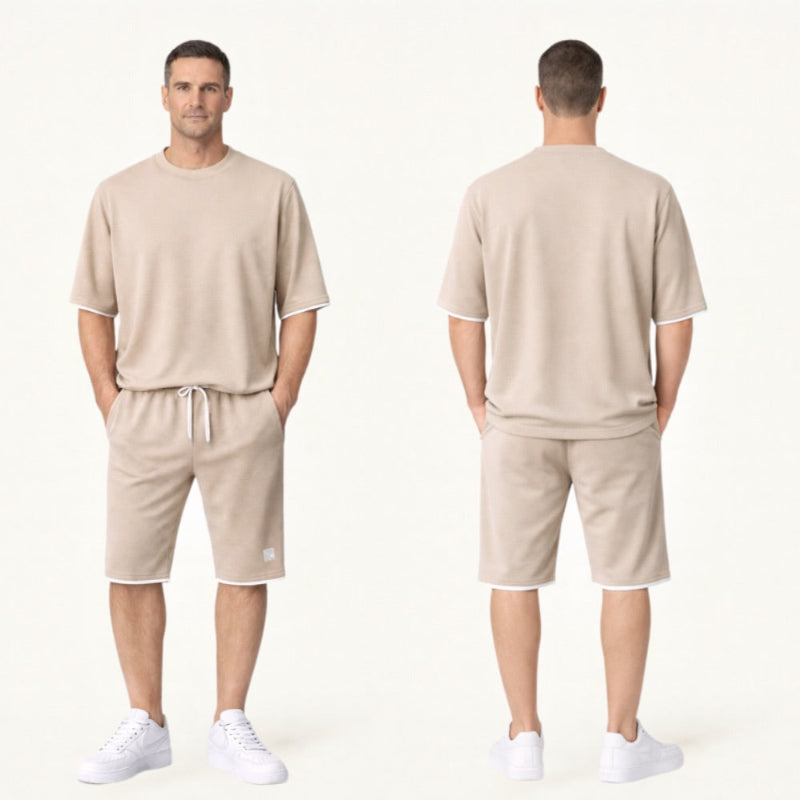 Man wearing a beige outfit with shorts and a t-shirt, standing front and back on a white background.