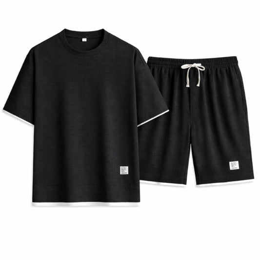 Black t-shirt and shorts set on a white background