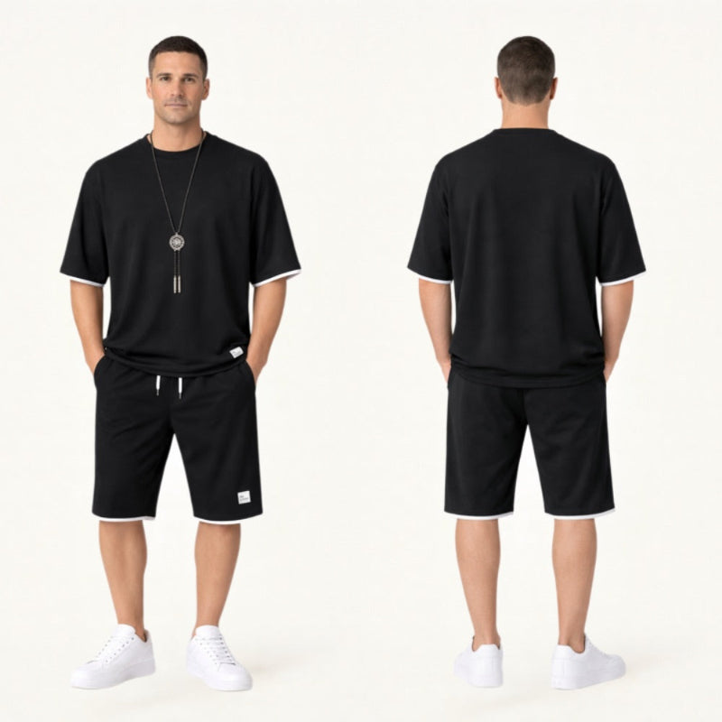 Man wearing a black outfit with shorts and a t-shirt, shown from front and back on a white background.