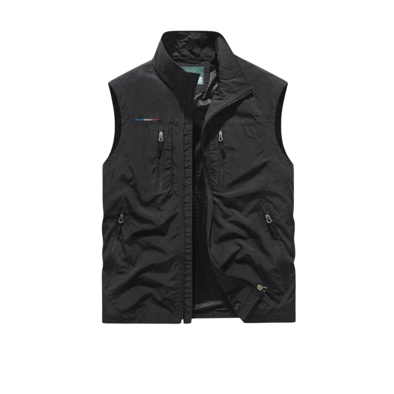 Black vest with multiple pockets on a white background