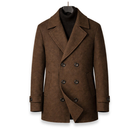 Brown coat on a hanger against a white background