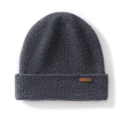 Dark Gray knit beanie with a brand label on a white background
