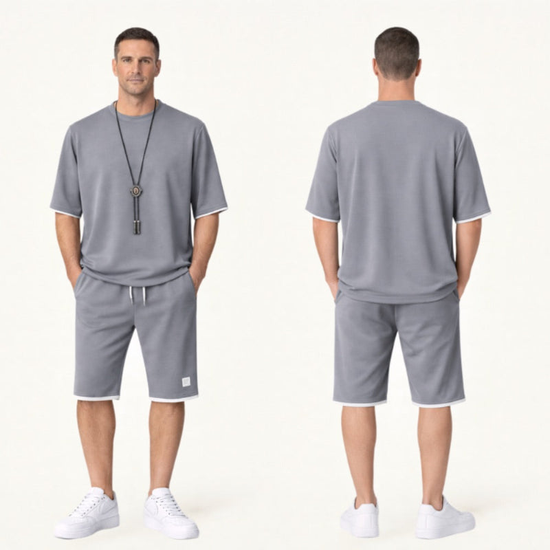 Man wearing a gray outfit with shorts and a t-shirt, shown from front and back on a white background.