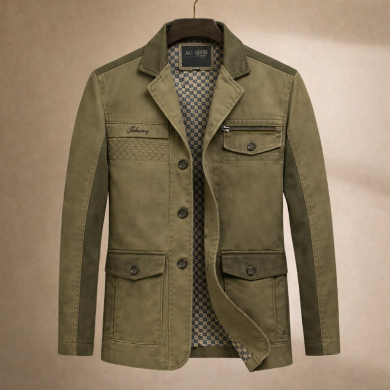 Green jacket with a checkered shirt underneath on a beige background