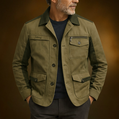 Man wearing a green jacket with a brown background