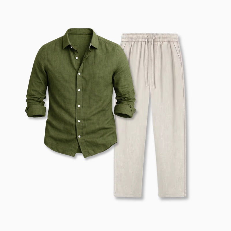 Green button-up shirt with rolled-up sleeves on a neutral background and beige linen pants