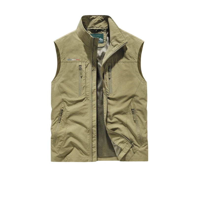 Khaki vest with zippers on a white background