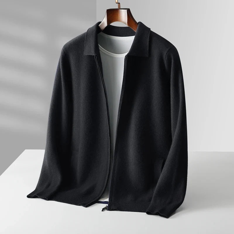 Black jacket on a white surface with a gray background