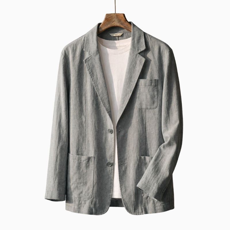 Light Gray blazer on a wooden hanger against a white background