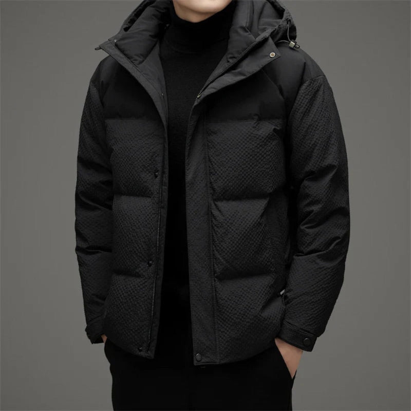 Ludovico Luxe Down Jacket in black – elegant men’s hooded winter puffer coat offering premium insulation and minimalist design by Polumi.
