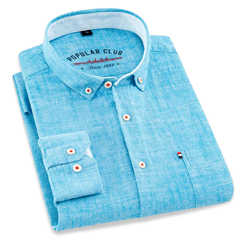Folded turquoise shirt with white collar on a white background
