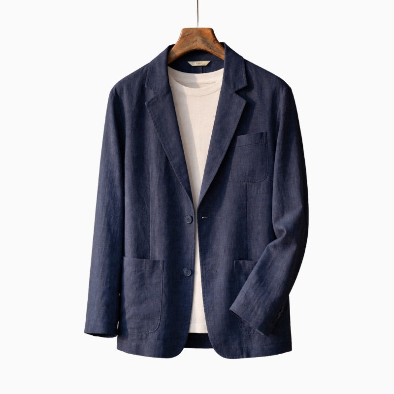 Navy blazer on a wooden hanger against a white background