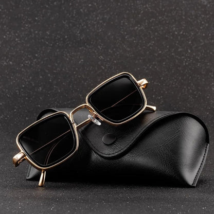 Luxury square sunglasses with gold metal frame and black lenses on black leather case – Achille Mr. Steel Sunglasses by Polumi.