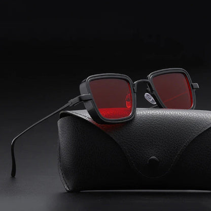 Black square sunglasses with red lenses and steel frame on luxury black leather case – Achille Mr. Steel Sunglasses by Polumi.