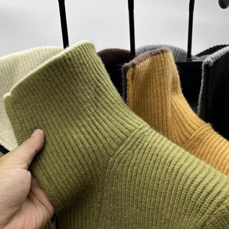 Close-up of Alberto High-Neck Quarter-Zip Sweater in green showing ribbed knit texture and soft premium wool fabric by Polumi.
