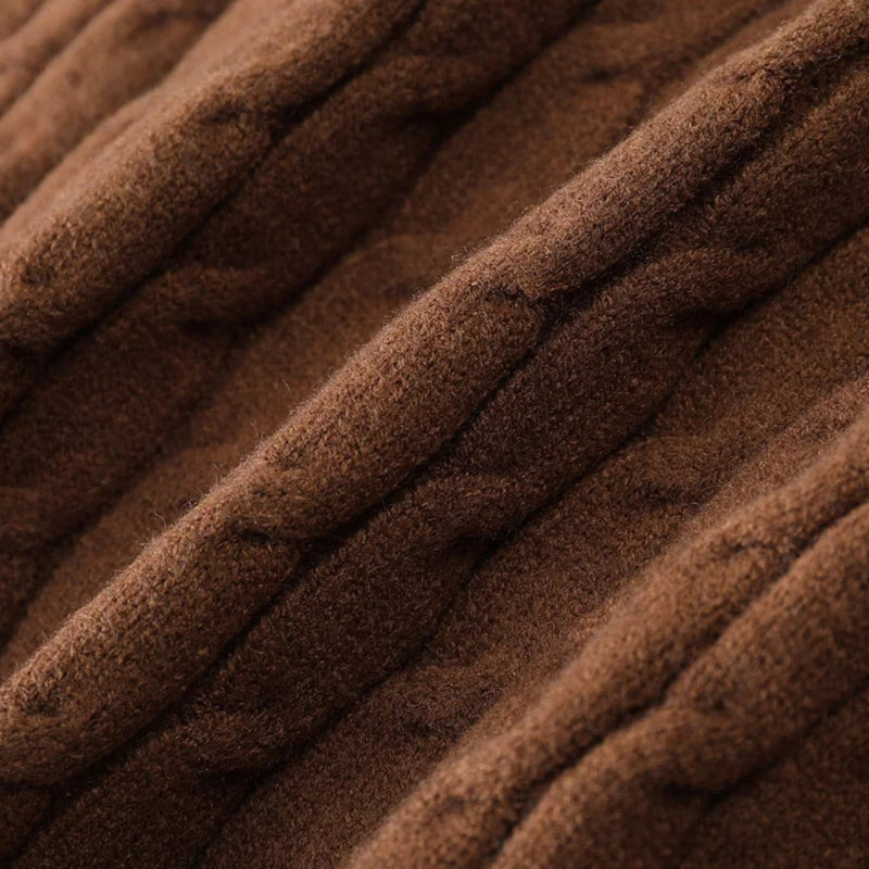 Close-up of Alberto Wool Soft Braid Cardigan brown – detailed braid knit wool texture by Polumi.