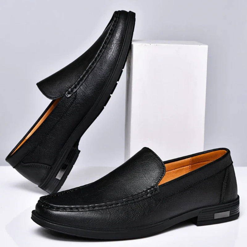 Pair of Aldo Slip On Leather Loafers in black, sleek and durable men's leather loafers for daily and formal use by Polumi.