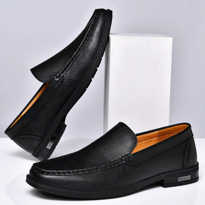 Pair of Aldo Slip On Leather Loafers in black, sleek and durable men's leather loafers for daily and formal use by Polumi.