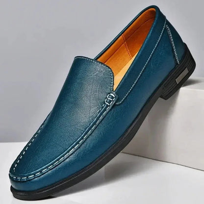 Aldo Slip On Leather Loafers in blue, elegant men's slip-on shoes with stitched detailing and soft leather finish by Polumi.
