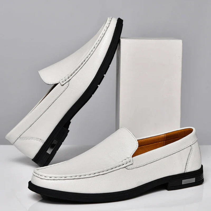 Pair of Aldo Slip On Leather Loafers in white, refined casual men's leather loafers ideal for everyday wear by Polumi.