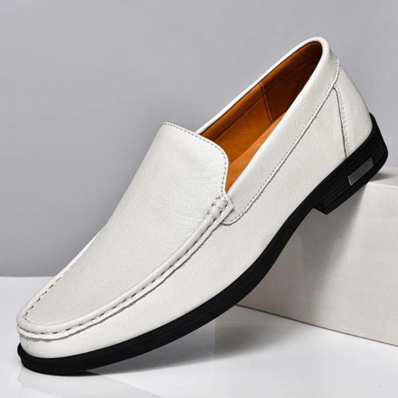 Aldo Slip On Leather Loafers in white, modern leather loafers for men featuring sleek silhouette and comfort lining by Polumi.