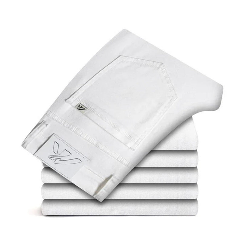 Folded Alessandro Flex Cotton Jeans in white with signature logo detail – Polumi modern men’s fashion denim.