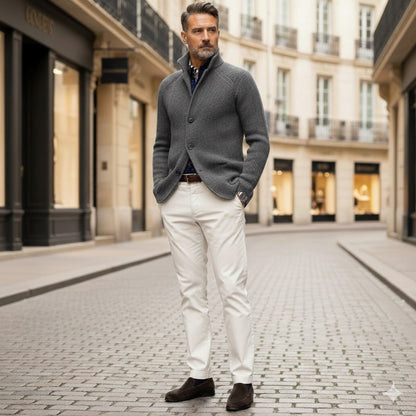 Elegant man in gray Alfredo Gentleman Cardigan with cream pants, classic European street style