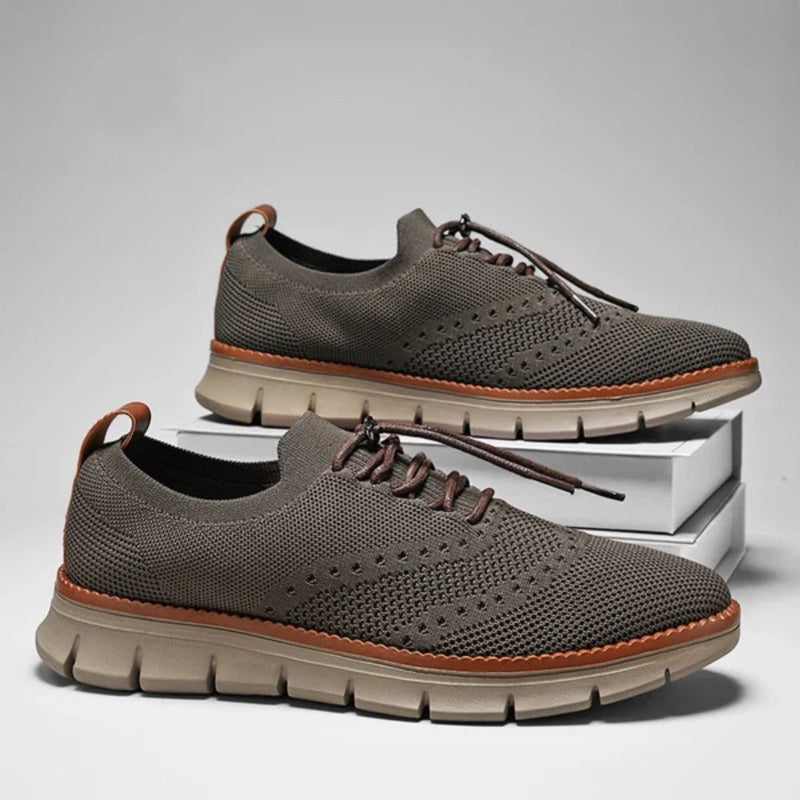 Pair of Alfredo Premium Mesh Sneakers in gray, versatile lightweight sneakers designed for all-day comfort by Polumi.