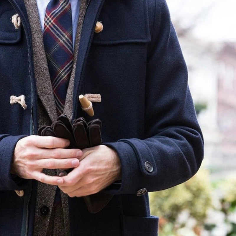 Close-up of Alfredo Wool Trench Coat in navy showing toggle closures and premium wool texture – sophisticated men’s coat by Polumi.