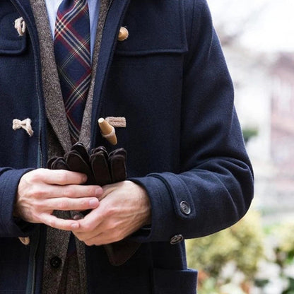 Close-up of Alfredo Wool Trench Coat in navy showing toggle closures and premium wool texture – sophisticated men’s coat by Polumi.