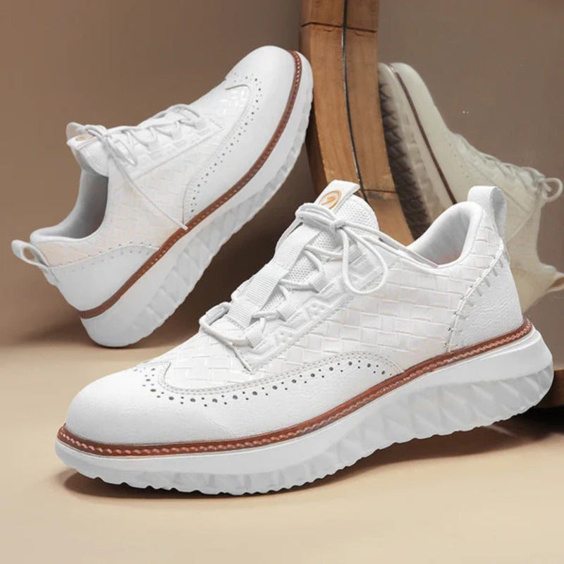 White Bruno Ridge Leather Sneakers featuring woven leather texture and brown trim, lightweight luxury sneakers for men