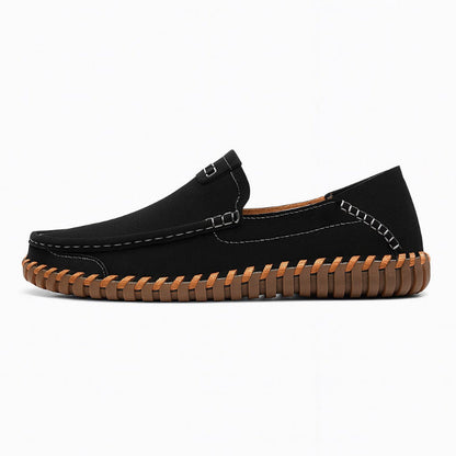 Black suede loafers for men by Polumi — stylish slip-on driving shoes with contrast stitching and a durable tread sole for elegant everyday wear.