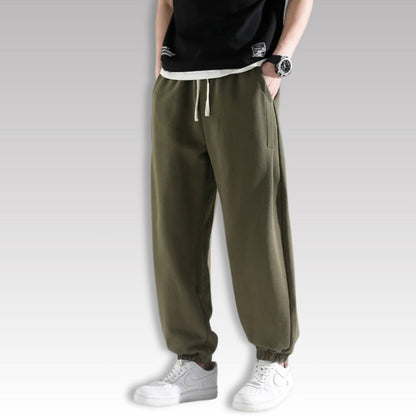 Corrado Premium Joggers in olive green, casual relaxed men’s jogger pants with side pockets and drawstring.