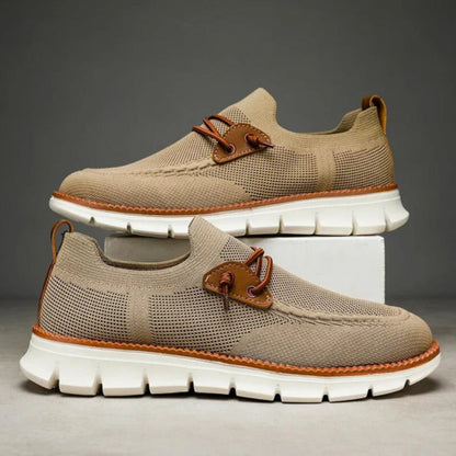 Pair of Davide Mesh Lightweight Shoes in beige, breathable slip-on design with brown leather accents and white outsole