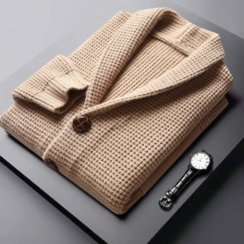 Folded Domenico Cable Wool Cardigan in beige – premium textured knitwear for men with elegant wood buttons and refined finish by Polumi.