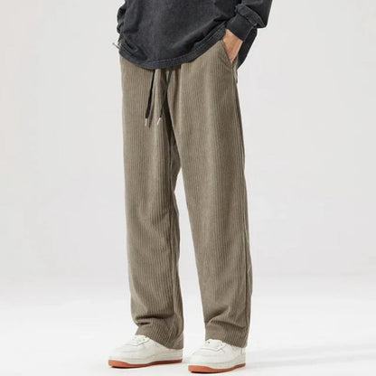 Emanuele Corduroy Pants in gray – modern men's corduroy trousers with adjustable drawstring waist and straight leg fit by Polumi.