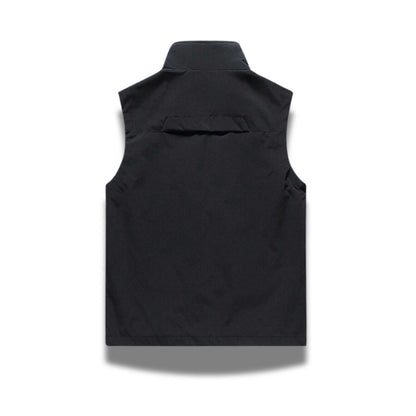 Back view of Ennio Zip Adapt Vest in black – sleek and durable men’s sleeveless jacket ideal for layering by Polumi.