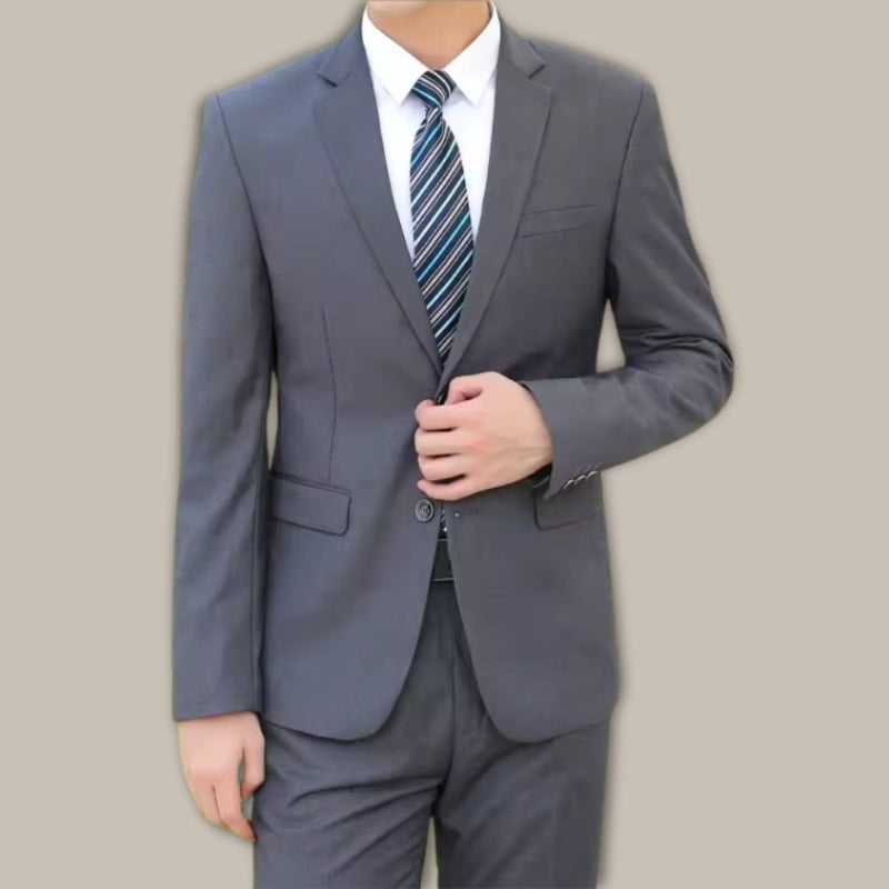 Model Wearing Firenze Gray Men's Suit – Elegant Slim Fit Blazer and Pants for Business and Formal Occasions

