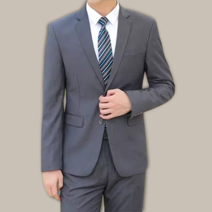 Model Wearing Firenze Gray Men's Suit – Elegant Slim Fit Blazer and Pants for Business and Formal Occasions
