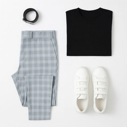 Flat lay of Giacomo Timeless Check Pants in sky blue paired with black T-shirt, black belt, and white sneakers – Polumi modern men’s outfit inspiration.