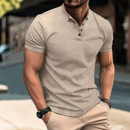 Man wearing beige Henley T-shirt with button placket – casual street style look.