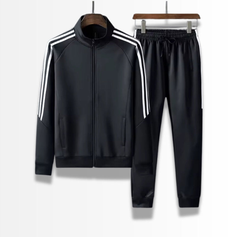 Luca Premium Tracksuit Set in black – elegant men’s sport set by Polumi featuring zip jacket and tapered pants with white stripes.