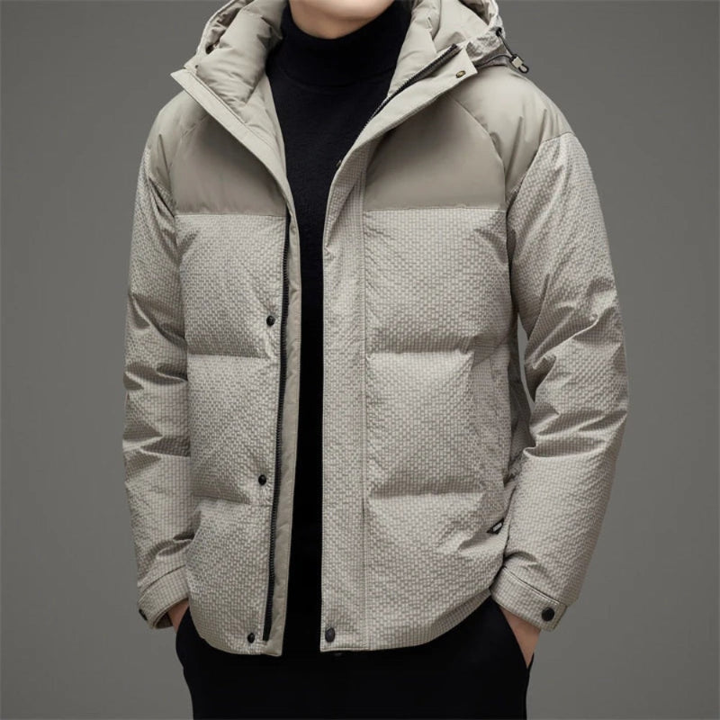 Ludovico Luxe Down Jacket in gray – lightweight insulated men’s jacket with hood, featuring quilted panels and refined modern silhouette by Polumi.